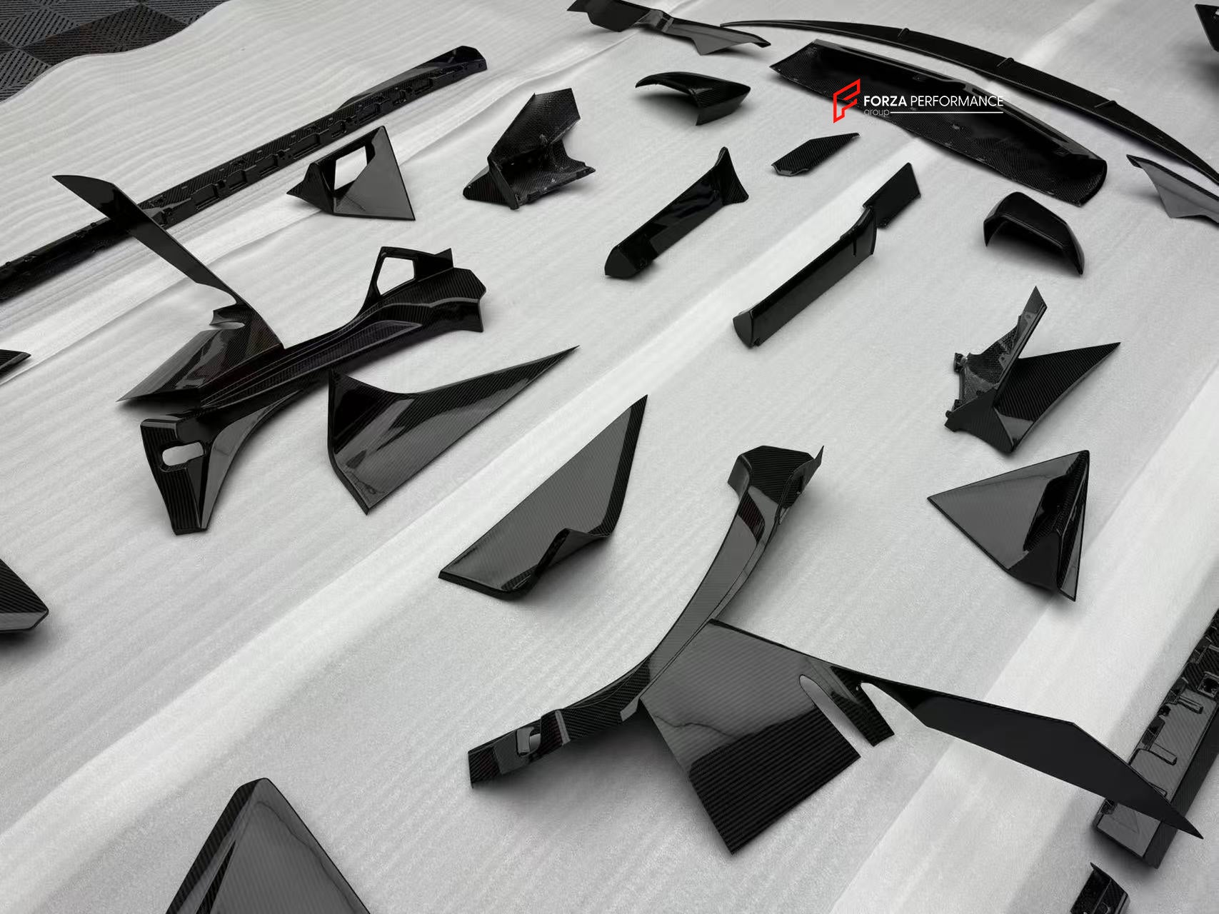 CARBON FRONT LIP for LAMBORGHINI REVUELTO 2023+

Set includes:

Front Lip Splitter
Front Bumper Canards
Side Mirror Covers
Fender Trims
Side Skirts
Air Vents Trims
Rear Engine Bay Cover
Rear Wing Spoiler
Rear Bumper Canards
Rear Diffuser

Material: Carbon

NOTE: Professional installation is required.