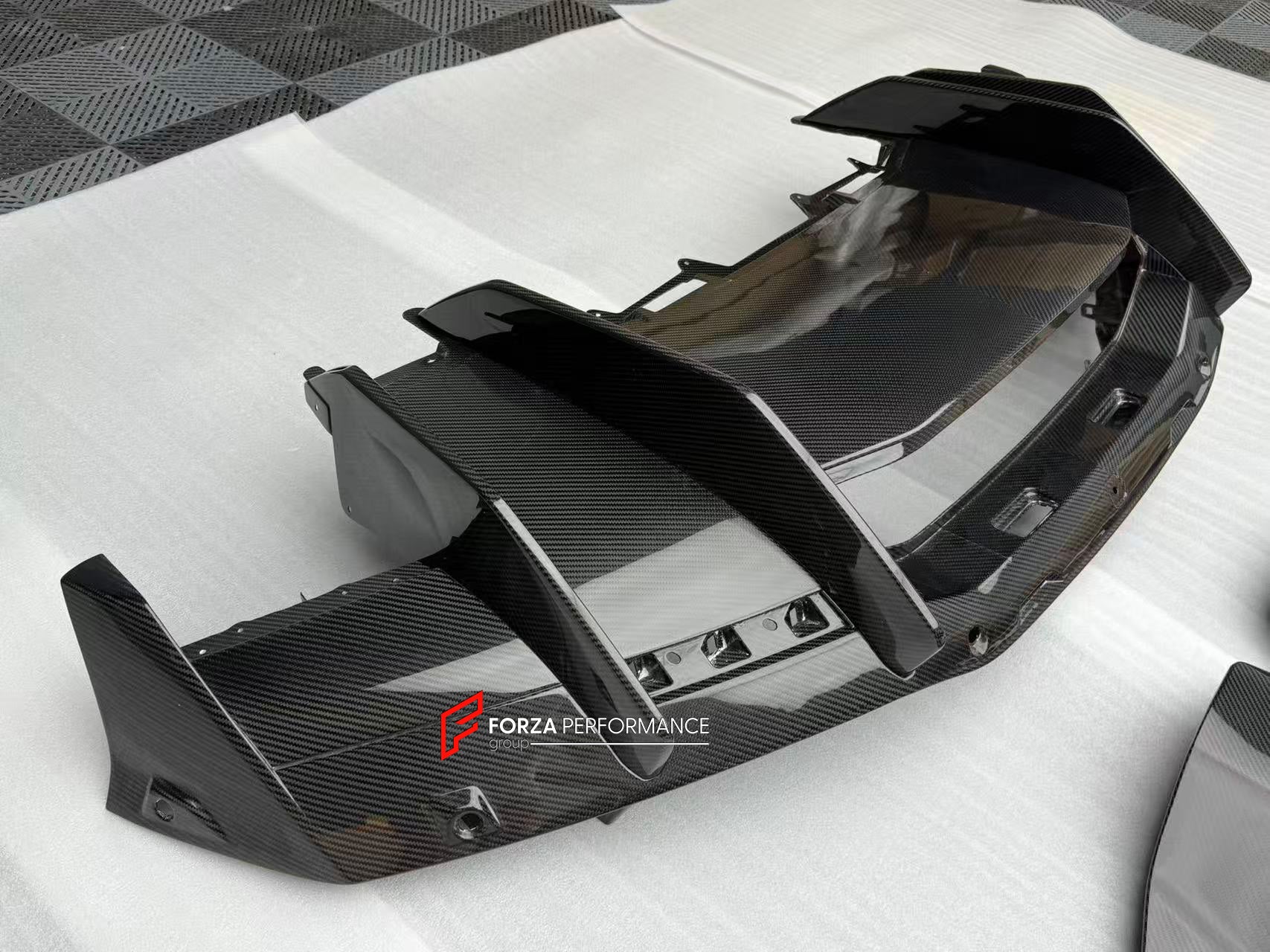 CARBON FRONT LIP for LAMBORGHINI REVUELTO 2023+

Set includes:

Front Lip Splitter
Front Bumper Canards
Side Mirror Covers
Fender Trims
Side Skirts
Air Vents Trims
Rear Engine Bay Cover
Rear Wing Spoiler
Rear Bumper Canards
Rear Diffuser

Material: Carbon

NOTE: Professional installation is required.