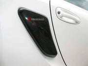 Carbon Side Fender Air Scoop for Porsche Cayman 987 2006 - 2010
Set includes:

Side Fender Air Scoop
Material: Carbon

NOTE: Professional installation is required.