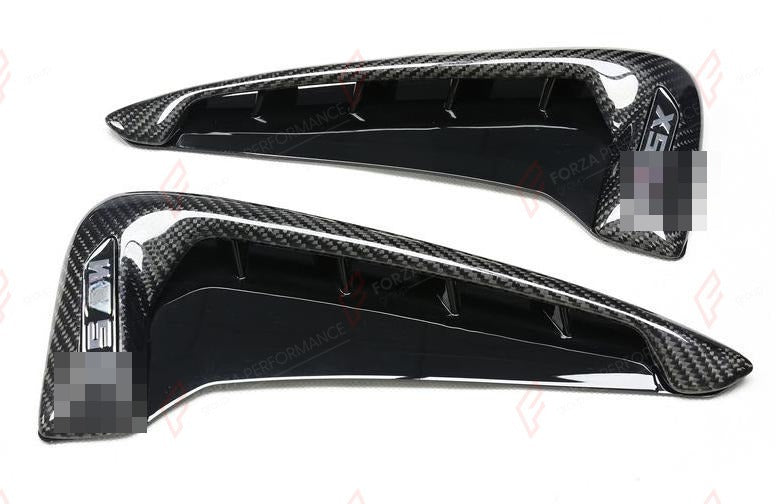 CARBON SIDE FENDER TRIMS for BMW X5 F15 2014 - 2018
Set includes:

Side Fender Trims
Material: Carbon

NOTE: Professional installation is required.