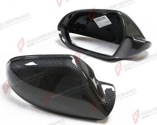 CARBON SIDE MIRROR COVERS for AUDI A6 S6 RS6 C7 2012 - 2018
Set includes:

Side Mirror Covers (with or without assist-sensor cutout - your choice)
Material: Carbon

NOTE: Available with or without the driver-assist sensor cutout - specify your version when ordering. Professional installation is required.