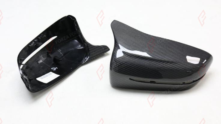 CARBON SIDE MIRROR COVERS M5 STYLE for BMW 8 SERIES G14 G15 G16 2018+
Set includes:

Side Mirror Covers
Material: Carbon

NOTE: Available for LHD and RHD cars - specify your drive side. For LHD (left-hand drive) cars only. Professional installation is required.