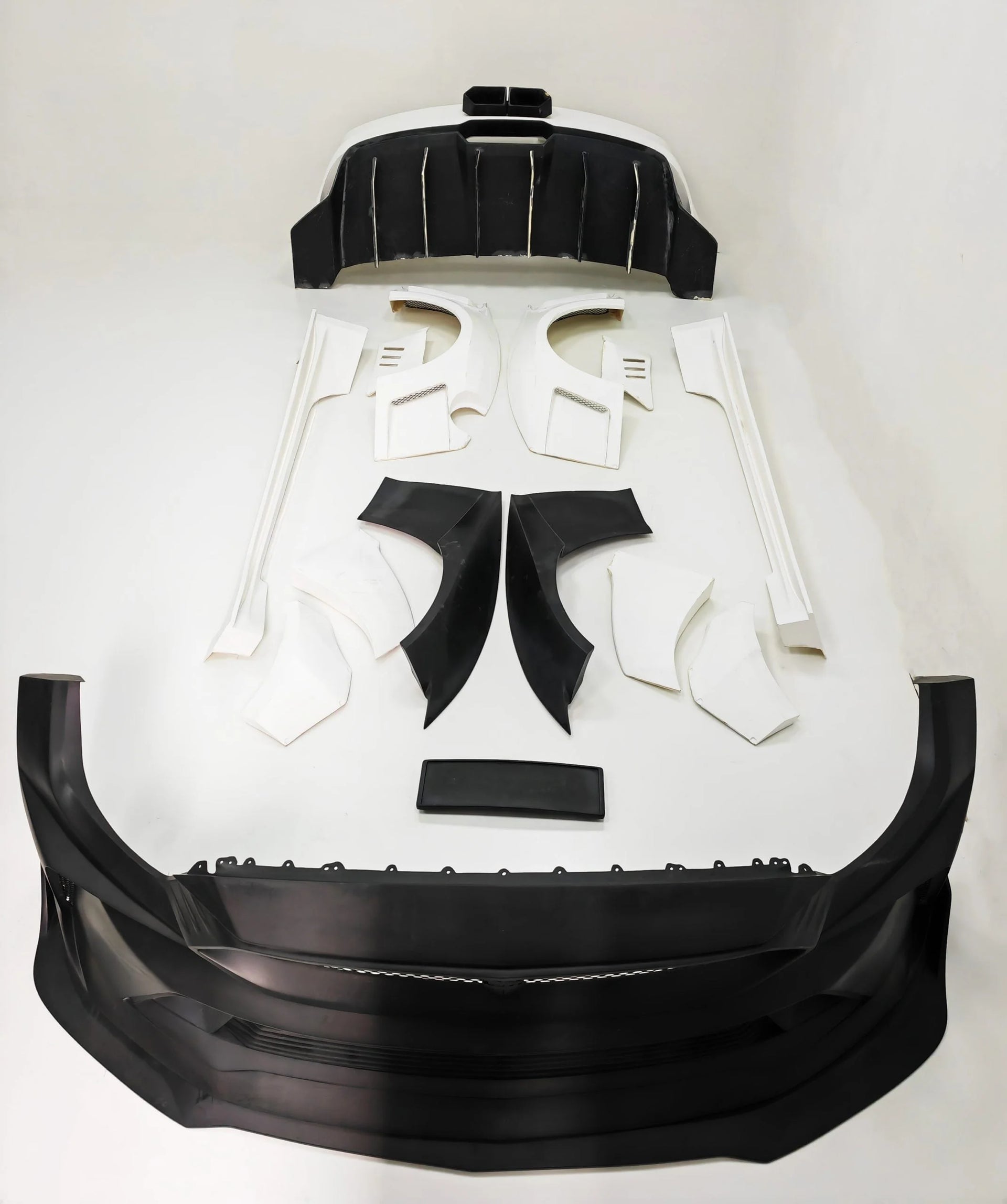 CARBON WIDE BODY KIT for FORD MUSTANG S550 2015 - 2023

Set includes:

Front Lip
Front Bumper Assembly

Hood / Bonnet
Roof Cover
Front Fenders
Side Skirts
Rear Fenders

Rear Window Cover
Trunk Cover
Rear Wing Spoiler
Rear Diffuser

Material:&nbsp;Wet Carbon with Fiberglass

NOTE:&nbsp;Professional installation is required. Exhaust modifying is required. Need to move the rear fog/reverse light.

Recommended Wheels size:

Front:&nbsp;20 x 9.5 ET -60

Rear:&nbsp;20 x 11.5 ET -55

Why “Contact Us for Pricing”?
