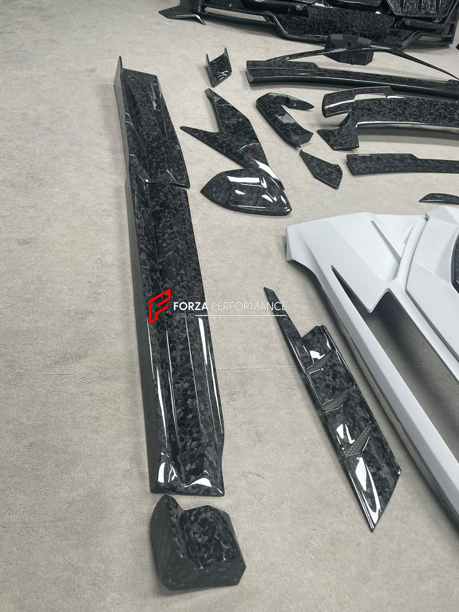 CARBON WIDE BODY KIT for LAMBORGHINI URUS SE 2024+ FORZA PERFORMANCE custom fit Mansory Style

Set includes:
Front Lip
Front Bumper Assembly
Hood Bonnet
Fender Flares
Side Mirror Covers
Side Skirts
Rear Bumper Assembly
Rear Diffuser

Material: Carbon

NOTE: Professional installation is required.