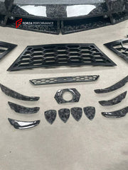 CARBON WIDE BODY KIT for LAMBORGHINI URUS SE 2024+ FORZA PERFORMANCE custom fit Mansory Style

Set includes:
Front Lip
Front Bumper Assembly
Hood Bonnet
Fender Flares
Side Mirror Covers
Side Skirts
Rear Bumper Assembly
Rear Diffuser

Material: Carbon

NOTE: Professional installation is required.