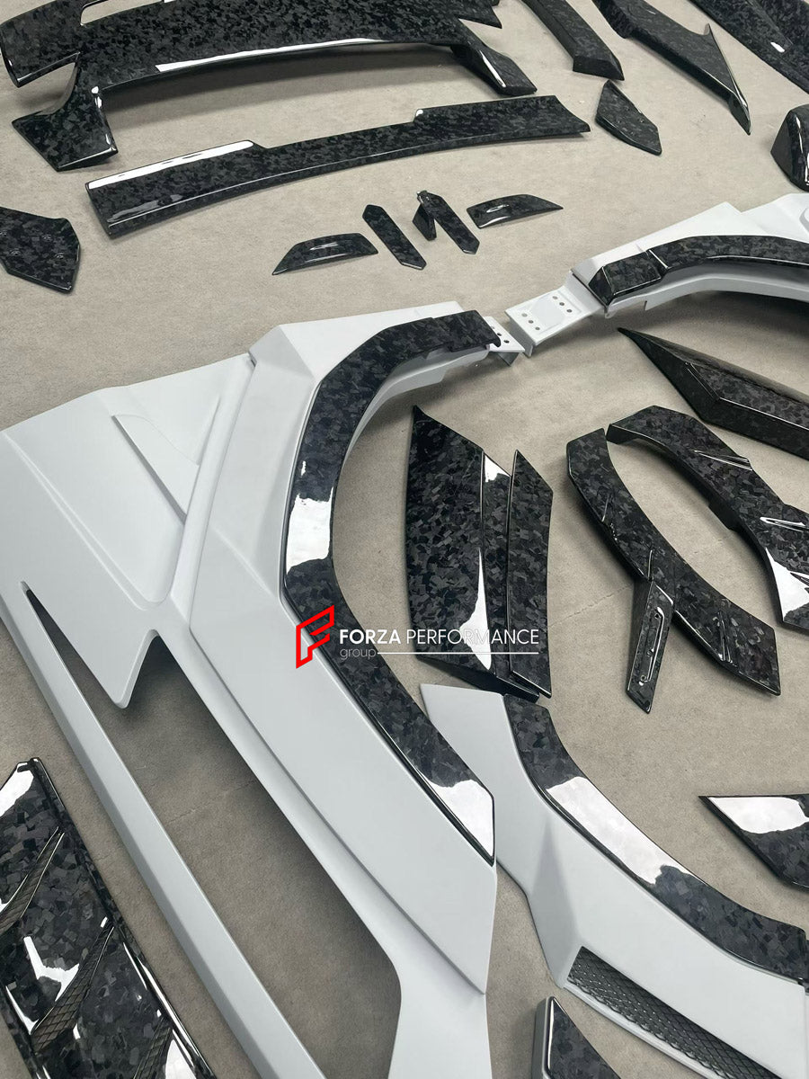 CARBON WIDE BODY KIT for LAMBORGHINI URUS SE 2024+ FORZA PERFORMANCE custom fit Mansory Style

Set includes:
Front Lip
Front Bumper Assembly
Hood Bonnet
Fender Flares
Side Mirror Covers
Side Skirts
Rear Bumper Assembly
Rear Diffuser

Material: Carbon

NOTE: Professional installation is required.