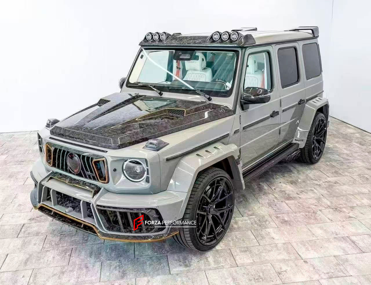 CARBON WIDE BODY KIT for MERCEDES-BENZ G-CLASS G63 W465 2024+


Set includes:

Front Lip
Front Bumper Assembly

Grille Frame
Grille
Headlight Cover
Front Fenders
Front Fender Flares
Hood / Bonnet
Hood / Bonnet Air Vent Cover
Roof LED DRL Bar

Roof Trims
Rear Spoiler
Door Panels
Rear Fenders
Rear Fender Flares
D Pillar Add-Ons
Spare Tire Cover
Rear Trunk Cover
Rear Bumper
Rear Diffuser

Material: Carbon Fiber

NOTE: Professional installation is required.