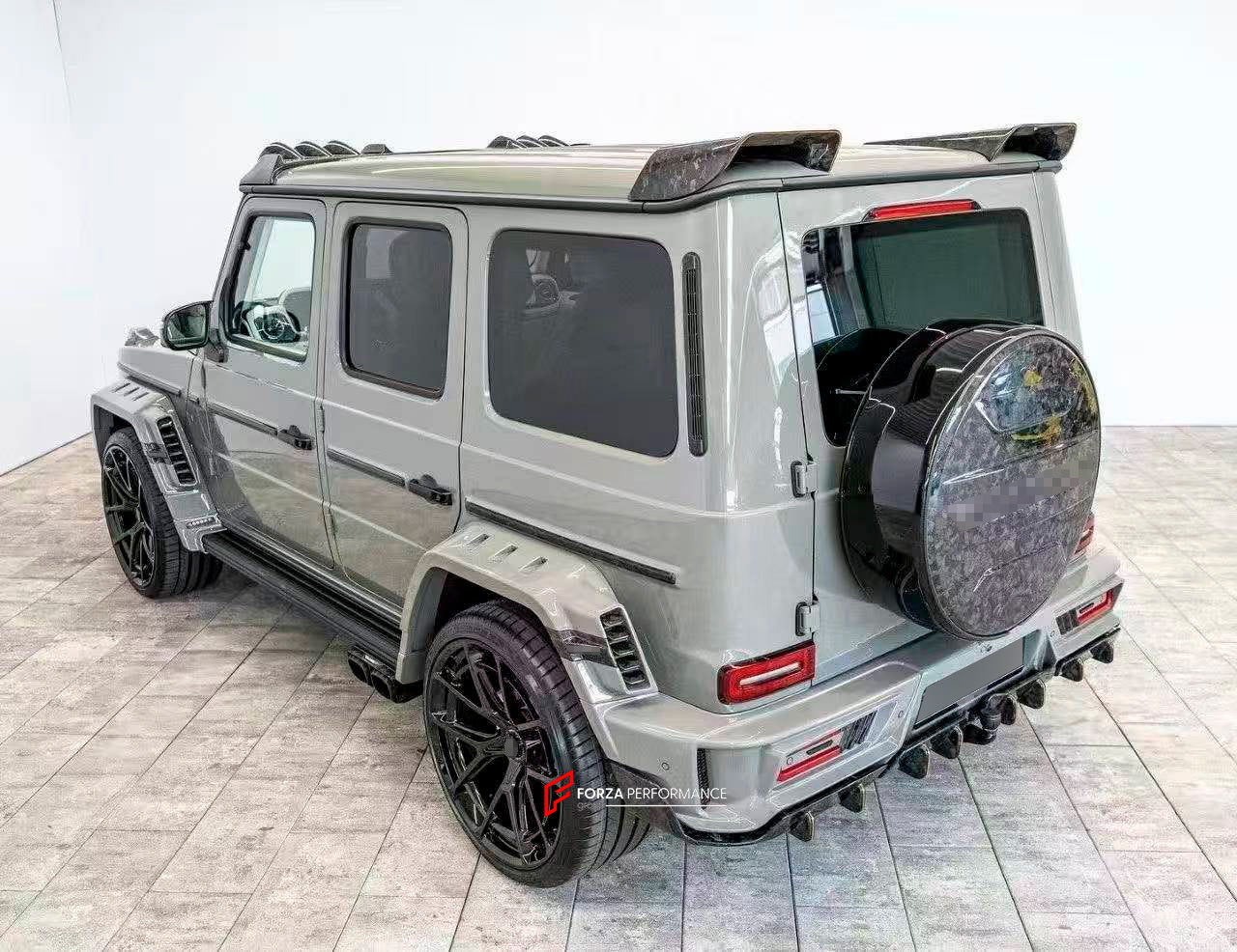 CARBON WIDE BODY KIT for MERCEDES-BENZ G-CLASS G63 W465 2024+


Set includes:

Front Lip
Front Bumper Assembly

Grille Frame
Grille
Headlight Cover
Front Fenders
Front Fender Flares
Hood / Bonnet
Hood / Bonnet Air Vent Cover
Roof LED DRL Bar

Roof Trims
Rear Spoiler
Door Panels
Rear Fenders
Rear Fender Flares
D Pillar Add-Ons
Spare Tire Cover
Rear Trunk Cover
Rear Bumper
Rear Diffuser

Material: Carbon Fiber

NOTE: Professional installation is required.