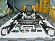 CARBON WIDE BODY KIT for MERCEDES-BENZ G-CLASS G63 W465 2024+


Set includes:

Front Lip
Front Bumper Assembly

Grille Frame
Grille
Headlight Cover
Front Fenders
Front Fender Flares
Hood / Bonnet
Hood / Bonnet Air Vent Cover
Roof LED DRL Bar

Roof Trims
Rear Spoiler
Door Panels
Rear Fenders
Rear Fender Flares
D Pillar Add-Ons
Spare Tire Cover
Rear Trunk Cover
Rear Bumper
Rear Diffuser

Material: Carbon Fiber

NOTE: Professional installation is required.