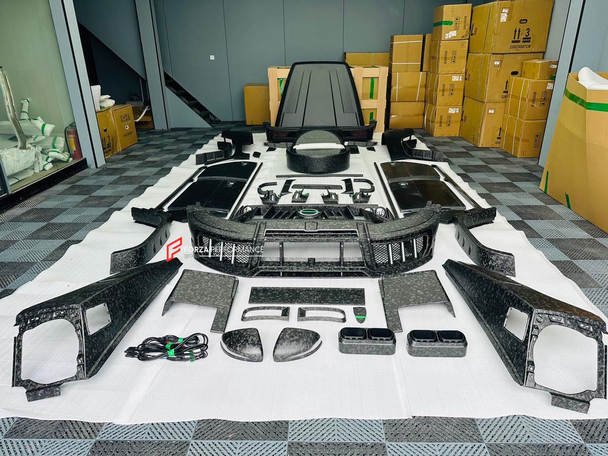 CARBON WIDE BODY KIT for MERCEDES-BENZ G-CLASS G63 W465 2024+


Set includes:

Front Lip
Front Bumper Assembly

Grille Frame
Grille
Headlight Cover
Front Fenders
Front Fender Flares
Hood / Bonnet
Hood / Bonnet Air Vent Cover
Roof LED DRL Bar

Roof Trims
Rear Spoiler
Door Panels
Rear Fenders
Rear Fender Flares
D Pillar Add-Ons
Spare Tire Cover
Rear Trunk Cover
Rear Bumper
Rear Diffuser

Material: Carbon Fiber

NOTE: Professional installation is required.