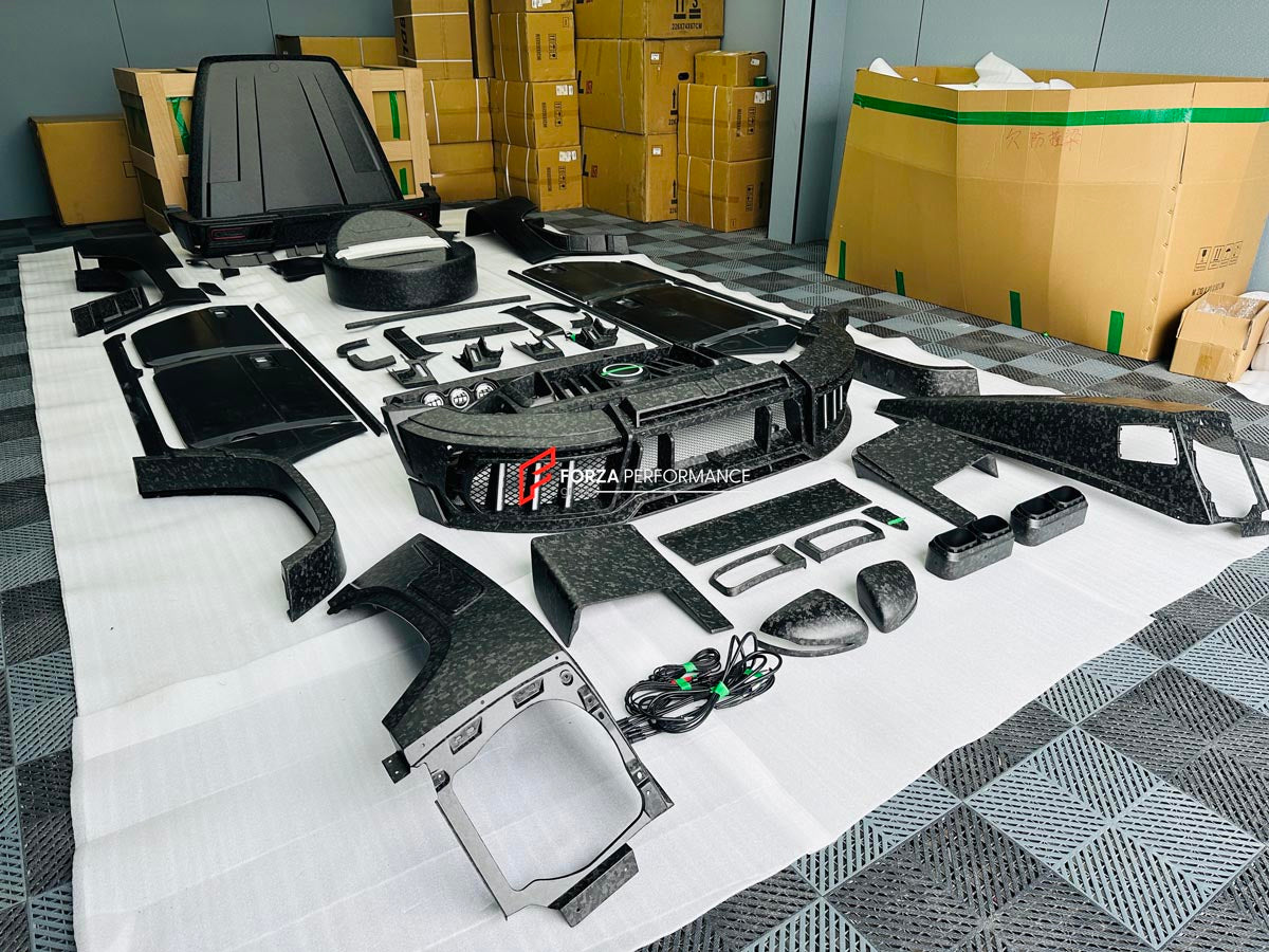CARBON WIDE BODY KIT for MERCEDES-BENZ G-CLASS G63 W465 2024+


Set includes:

Front Lip
Front Bumper Assembly

Grille Frame
Grille
Headlight Cover
Front Fenders
Front Fender Flares
Hood / Bonnet
Hood / Bonnet Air Vent Cover
Roof LED DRL Bar

Roof Trims
Rear Spoiler
Door Panels
Rear Fenders
Rear Fender Flares
D Pillar Add-Ons
Spare Tire Cover
Rear Trunk Cover
Rear Bumper
Rear Diffuser

Material: Carbon Fiber

NOTE: Professional installation is required.