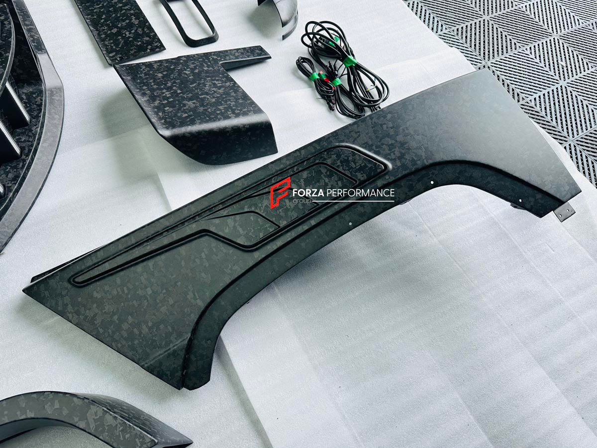 CARBON WIDE BODY KIT for MERCEDES-BENZ G-CLASS G63 W465 2024+


Set includes:

Front Lip
Front Bumper Assembly

Grille Frame
Grille
Headlight Cover
Front Fenders
Front Fender Flares
Hood / Bonnet
Hood / Bonnet Air Vent Cover
Roof LED DRL Bar

Roof Trims
Rear Spoiler
Door Panels
Rear Fenders
Rear Fender Flares
D Pillar Add-Ons
Spare Tire Cover
Rear Trunk Cover
Rear Bumper
Rear Diffuser

Material: Carbon Fiber

NOTE: Professional installation is required.