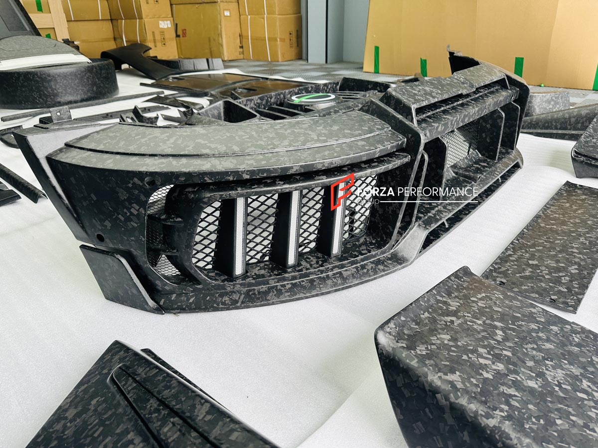 CARBON WIDE BODY KIT for MERCEDES-BENZ G-CLASS G63 W465 2024+


Set includes:

Front Lip
Front Bumper Assembly

Grille Frame
Grille
Headlight Cover
Front Fenders
Front Fender Flares
Hood / Bonnet
Hood / Bonnet Air Vent Cover
Roof LED DRL Bar

Roof Trims
Rear Spoiler
Door Panels
Rear Fenders
Rear Fender Flares
D Pillar Add-Ons
Spare Tire Cover
Rear Trunk Cover
Rear Bumper
Rear Diffuser

Material: Carbon Fiber

NOTE: Professional installation is required.