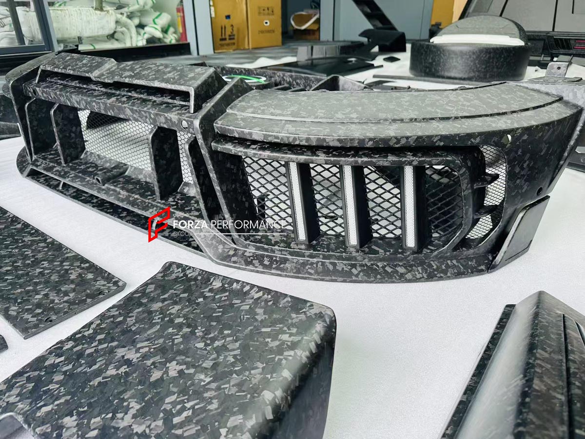 CARBON WIDE BODY KIT for MERCEDES-BENZ G-CLASS G63 W465 2024+


Set includes:

Front Lip
Front Bumper Assembly

Grille Frame
Grille
Headlight Cover
Front Fenders
Front Fender Flares
Hood / Bonnet
Hood / Bonnet Air Vent Cover
Roof LED DRL Bar

Roof Trims
Rear Spoiler
Door Panels
Rear Fenders
Rear Fender Flares
D Pillar Add-Ons
Spare Tire Cover
Rear Trunk Cover
Rear Bumper
Rear Diffuser

Material: Carbon Fiber

NOTE: Professional installation is required.