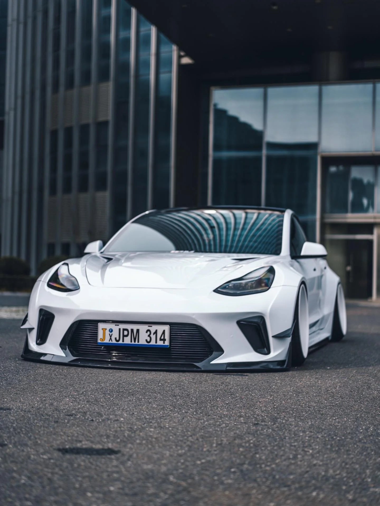 CARBON BODY KIT for TESLA MODEL 3 2017 - 2023

Set includes:

Front Lip
Front Bumper Assembly
Front Bumper Canards
Front Wide Fenders
Hood / Bonnet

Side Skirts

Rear Wide Fenders
Rear Spoiler (3 option)
Rear Bumper
Rear Diffuser

Material:&nbsp;Wet Carbon with Fiberglass

NOTE:&nbsp;Professional installation is required.

Why “Contact Us for Pricing”?

We don’t display fixed prices because our goal is to offer you the most competitive deal possible. Product costs often decrease over time, and by requesting