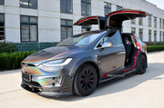 CARBON WIDE BODY KIT for TESLA MODEL X 2016+

Set Include:

Front Lip
Front Bumper Air Vent Trim
Fenders
Side Skirts
Rear Diffuser
Material: Carbon

Note: Professional installation is required.