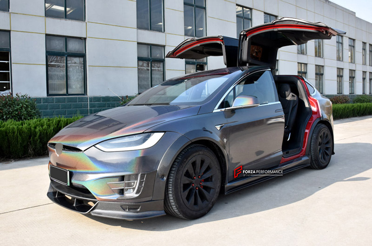 CARBON WIDE BODY KIT for TESLA MODEL X 2016+

Set Include:

Front Lip
Front Bumper Air Vent Trim
Fenders
Side Skirts
Rear Diffuser
Material: Carbon

Note: Professional installation is required.