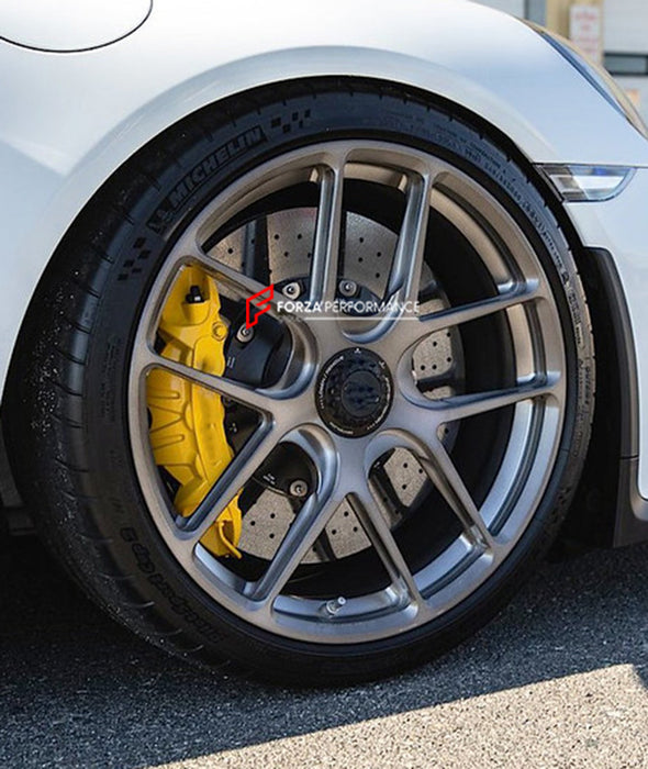 High-performance lightweight forged aluminum wheel for Porsche GT3, featuring precision engineering, exceptional strength, and a polished finish, designed for track and high-performance driving.