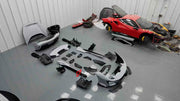 CONVERSION BODY KIT FOR FERRARI 488 2015+ upgrade to PISTA.

Set includes:

Front bumper
Carbon front lip
Carbon hood/bonnet
Carbon side skirts add-ons
Rear bumper
Carbon rear diffuser
Rear decklid spoiler

Material: Plastic

Note: Professional installation is required