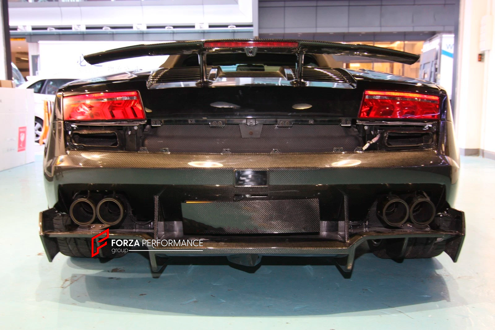 CONVERSION BODY KIT for LAMBORGHINI GALLARDO FACELIFT 2009 - 2014 UPGRADE to SUPERTROFEO

Set includes:

Front Bumper
Side Skirts
Engine Cover
Wing Spoiler

Material: Carbon

Note: Professional installation is required.