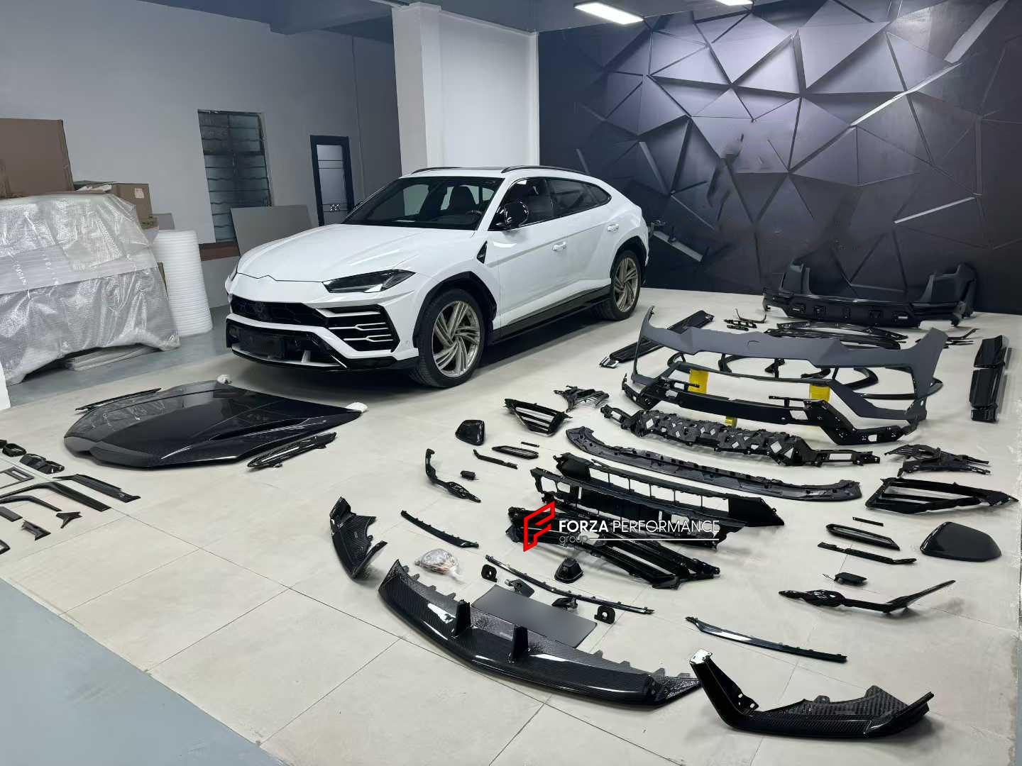 CONVERSION BODY KIT for LAMBORGHINI URUS 2018 - 2022 upgrade to PERFORMANTE

Set includes:

Front Lip
Front Bumper Assembly
Hood
Fender Flares
Side Mirror Covers
Side Skirts
Rear Trunk Spoiler
Roof Spoiler
Rear Bumper Asembly
Rear Diffuser
Interior Covers
Interior Trims

Material: Plastic + Carbon

Note: Professional installation is required.