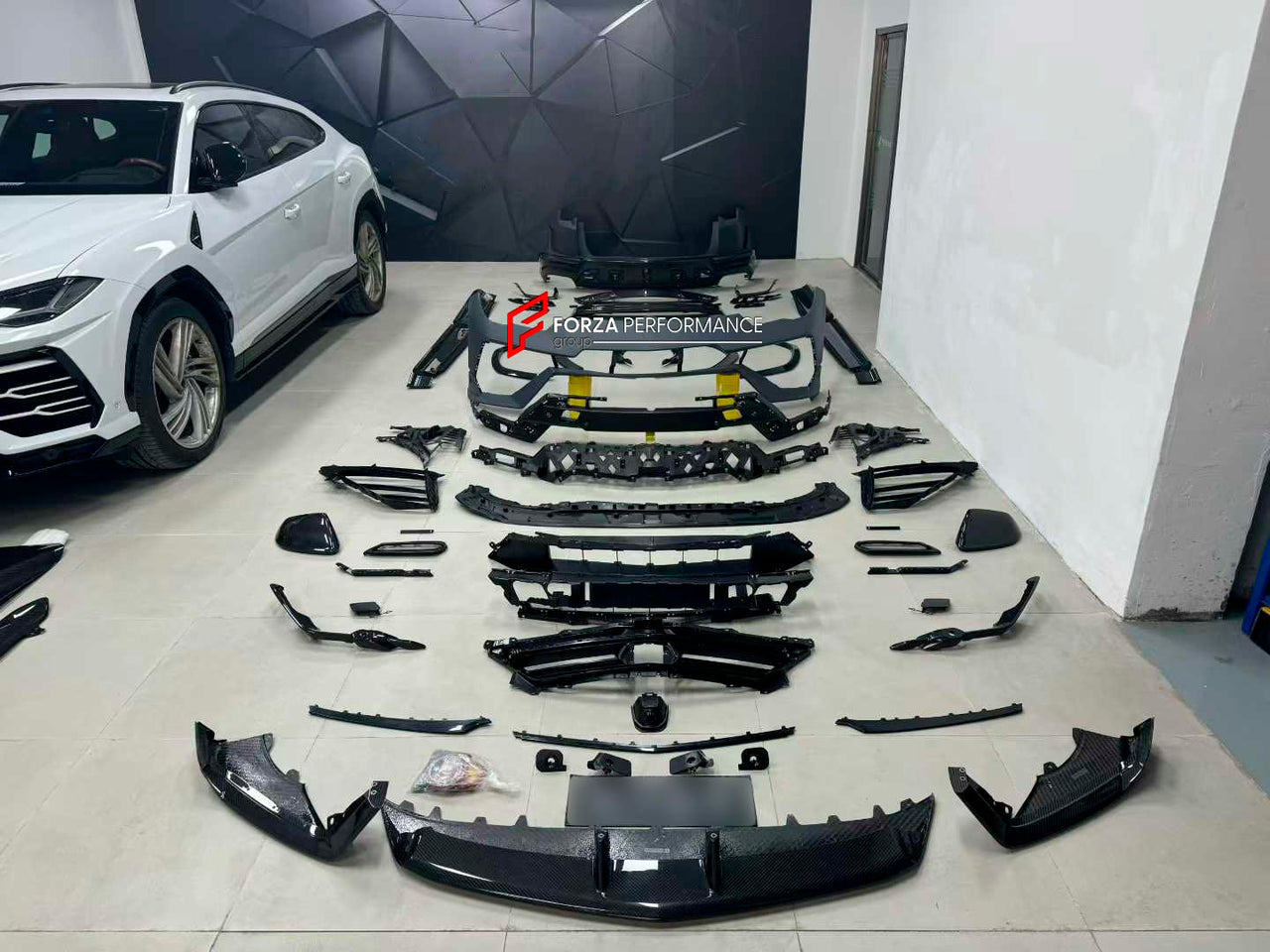 CONVERSION BODY KIT for LAMBORGHINI URUS 2018 - 2022 upgrade to PERFORMANTE

Set includes:

Front Lip
Front Bumper Assembly
Hood
Fender Flares
Side Mirror Covers
Side Skirts
Rear Trunk Spoiler
Roof Spoiler
Rear Bumper Asembly
Rear Diffuser
Interior Covers
Interior Trims

Material: Plastic + Carbon

Note: Professional installation is required.