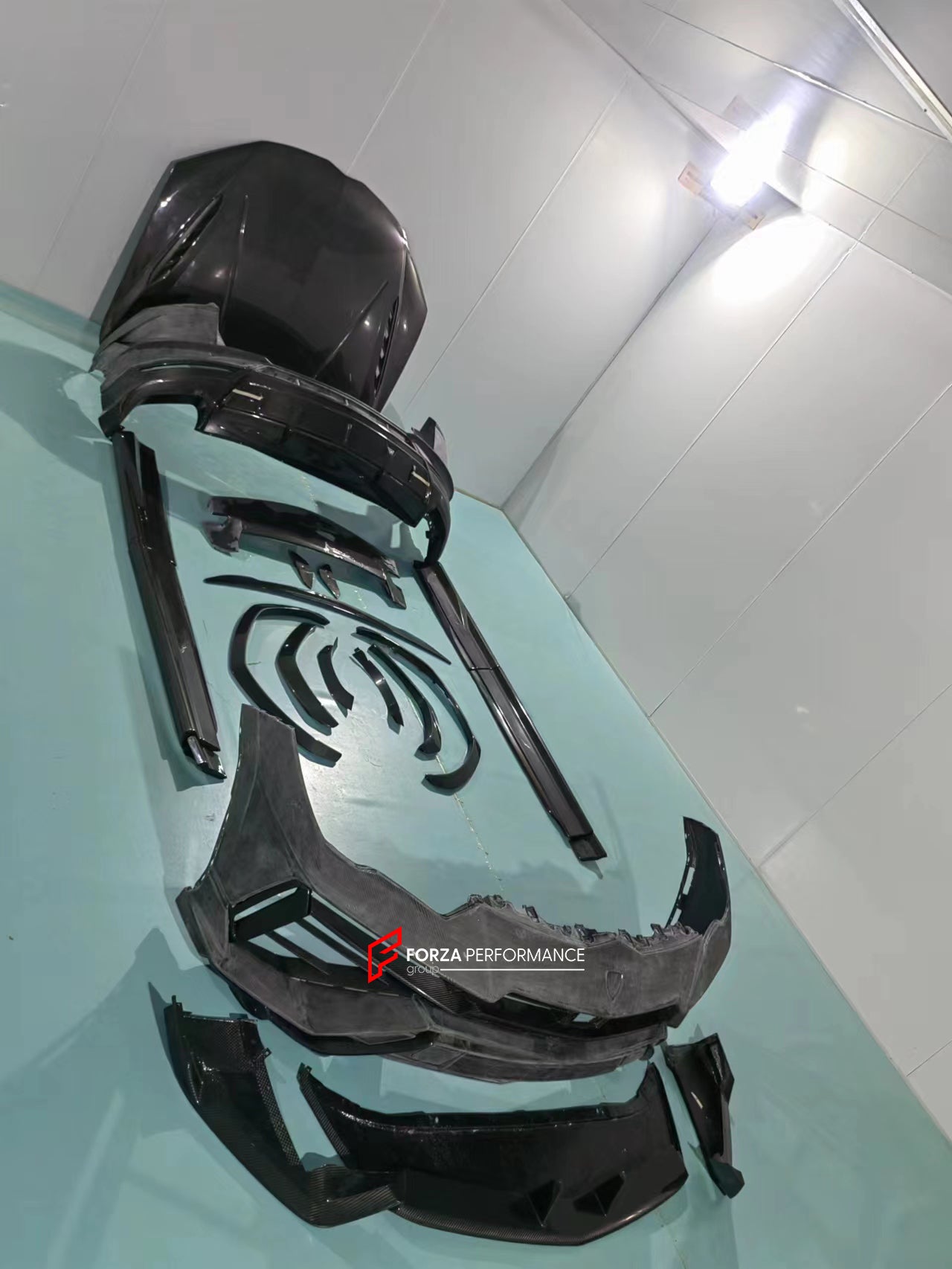 CONVERSION BODY KIT FOR LAMBORGHINI URUS UPGRADE TO PERFOMANTE  Set includes:  Front bumper assembly Front Lip Hood/Bonnet Mirror Covers Side Skirts Side fender flares Rear bumper assembly Rear canards Rear Diffuser