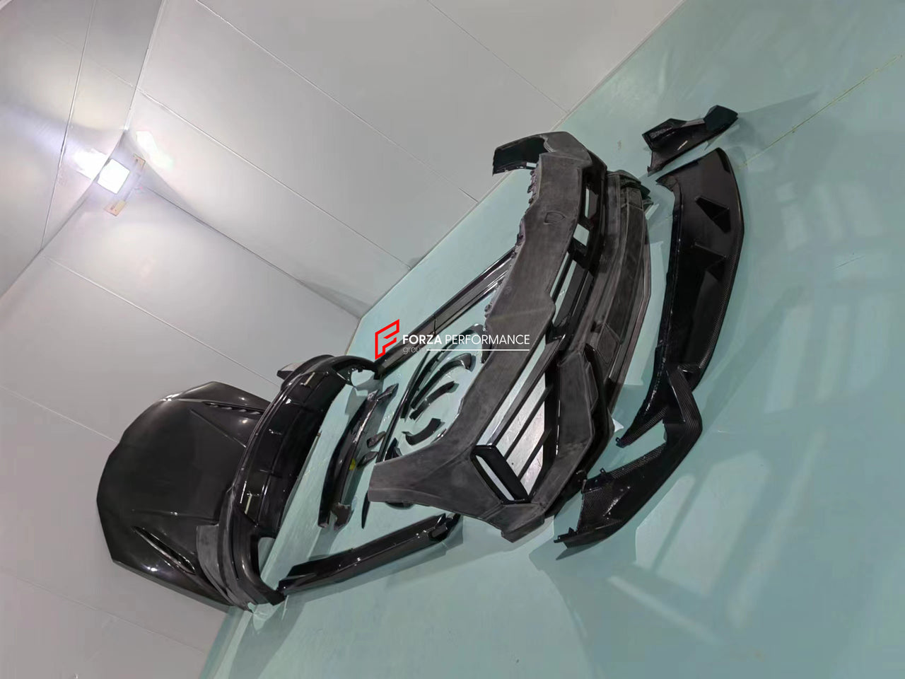 CONVERSION BODY KIT FOR LAMBORGHINI URUS UPGRADE TO PERFOMANTE  Set includes:  Front bumper assembly Front Lip Hood/Bonnet Mirror Covers Side Skirts Side fender flares Rear bumper assembly Rear canards Rear Diffuser