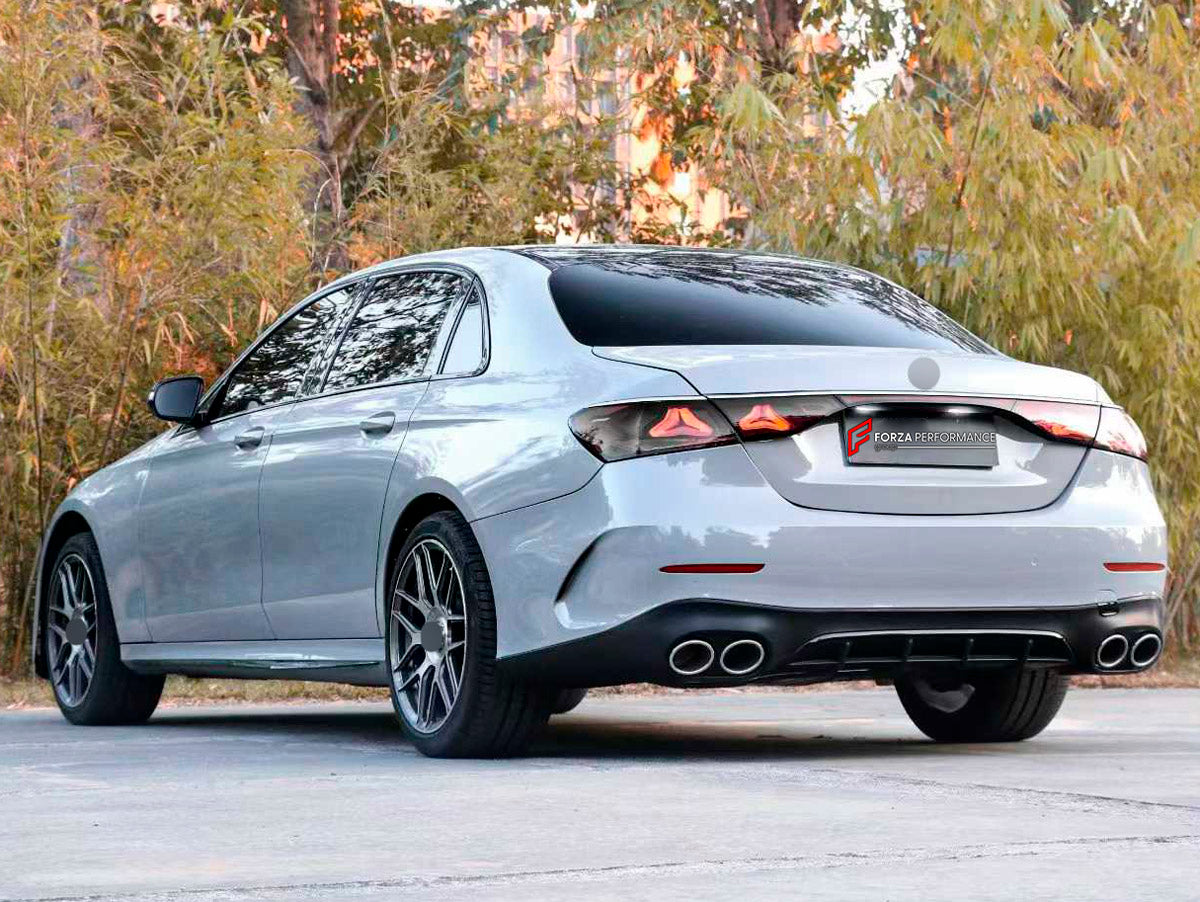 CONVERSION UPGRADE FACELIFT OLD TO NEW BODY KIT for Mercedes Benz E CLASS W213 2017 - 2024 to W214 E53 AMG 2024+
Set includes:

Front Lip
Front Bumper Assembly
Front Grille
Hood Bonnet
Front Fenders
Side Skirts
Trunk Lid
Rear Bumper Assembly
Rear Diffuser
Exhaust Tips
Material: Plastic

NOTE: Professional installation is required.