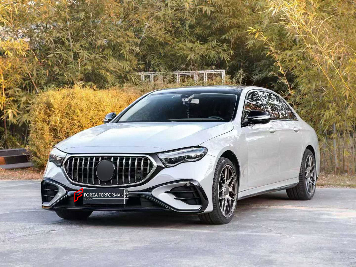 CONVERSION BODY KIT for MERCEDES-BENZ E CLASS W213 2016 - 2020 UPGRADE to W214 E53 2023+

Set includes:
Front Lip
Front Bumper Assembly
Front Grille
Headlights
Fog Lights Covers
License Plate
Hood Bonnet
Front Fenders
Trunk Lid
Tail Lights
Rear Bumper Assembly
Rear Diffuser
Exhaust Tips

Material: Plastic

NOTE: Professional installation is required.