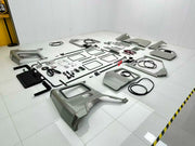 CONVERSION BODY KIT for MERCEDES-BENZ G-CLASS G63 W463 1990 - 2018 to W465 2025

Set includes:

Front Bumper Assembly
Front Grille
Hood
Headlights
Headlight Covers
Front Fenders
Fender Flares
Side Mirrors
Side Trims
Rear Bumper
Tail Lights
Exterior Trims
Front Body Panel
Rear Quarter Panel
Front Doors
Rear Doors

Interior Parts:

Dashboard Assembly
Central Console Assembly
Steering Wheel
Doors Panels
Seats
Wiring

Material: Plastic

NOTE: Professional installation and elctricain are required. Cutting is req