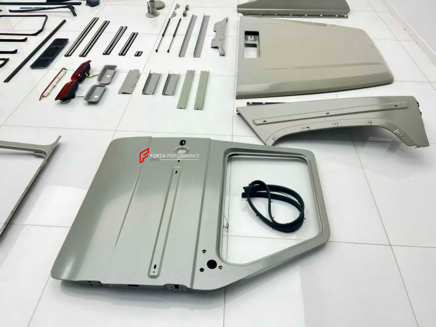 CONVERSION BODY KIT for MERCEDES-BENZ G-CLASS G63 W463 1990 - 2018 to W465 2025

Set includes:

Front Bumper Assembly
Front Grille
Hood
Headlights
Headlight Covers
Front Fenders
Fender Flares
Side Mirrors
Side Trims
Rear Bumper
Tail Lights
Exterior Trims
Front Body Panel
Rear Quarter Panel
Front Doors
Rear Doors

Interior Parts:

Dashboard Assembly
Central Console Assembly
Steering Wheel
Doors Panels
Seats
Wiring

Material: Plastic

NOTE: Professional installation and elctricain are required. Cutting is req