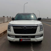 CONVERSION UPGRADE FACELIFT OLD TO NEW BODY KIT for Nissan Patrol Y62 2014 - 2020 to Y63 2024+
Set includes:

Front Lip
Front Bumper Assembly
Front Grille
Hood Bonnet
Front Fenders
Front Fender Vents
Side Mirror Covers
Side Skirts
Rear Fenders
Roof Spoiler
Rear Bumper
Rear Diffuser
Material: Plastic and Aluminum

NOTE: Professional installation is required.