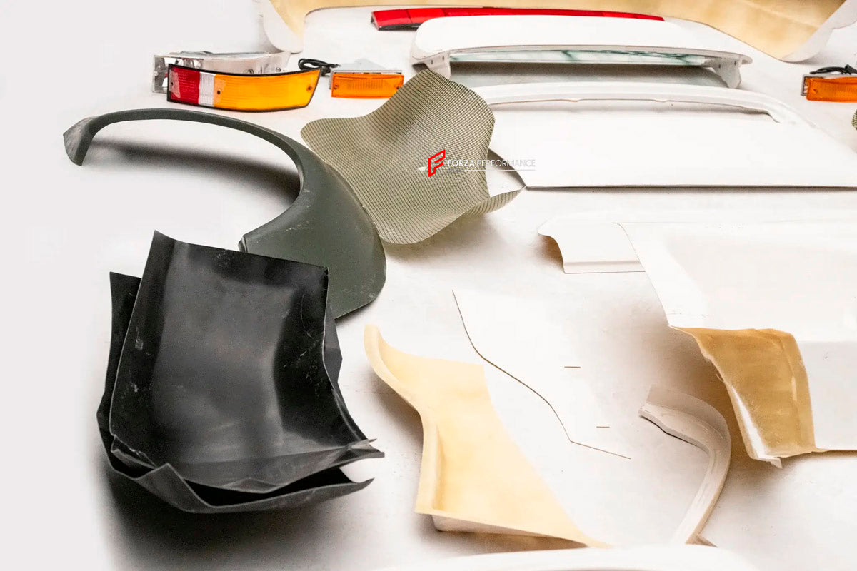 CONVERSION BODY KIT for PORSCHE 911 964 CARRERA NARROW WIDE BODY / TURBO WIDE BODY 1989 - 1994

Set includes:

Front Bumper
Front Fenders
Rear Fender Flares
Dashboard Aluminium Trim
Smooth Interior Kit
Tail Lights
Deck Lid
Grille
Rear Spoiler

Material: Fiberglass

NOTE: Professional installation is required.

CONTACT US FOR PRICING

Why “Contact Us for Pricing”?

We don’t display fixed prices because our goal is to offer you the most competitive deal possible. Product costs often decrease over time, and by