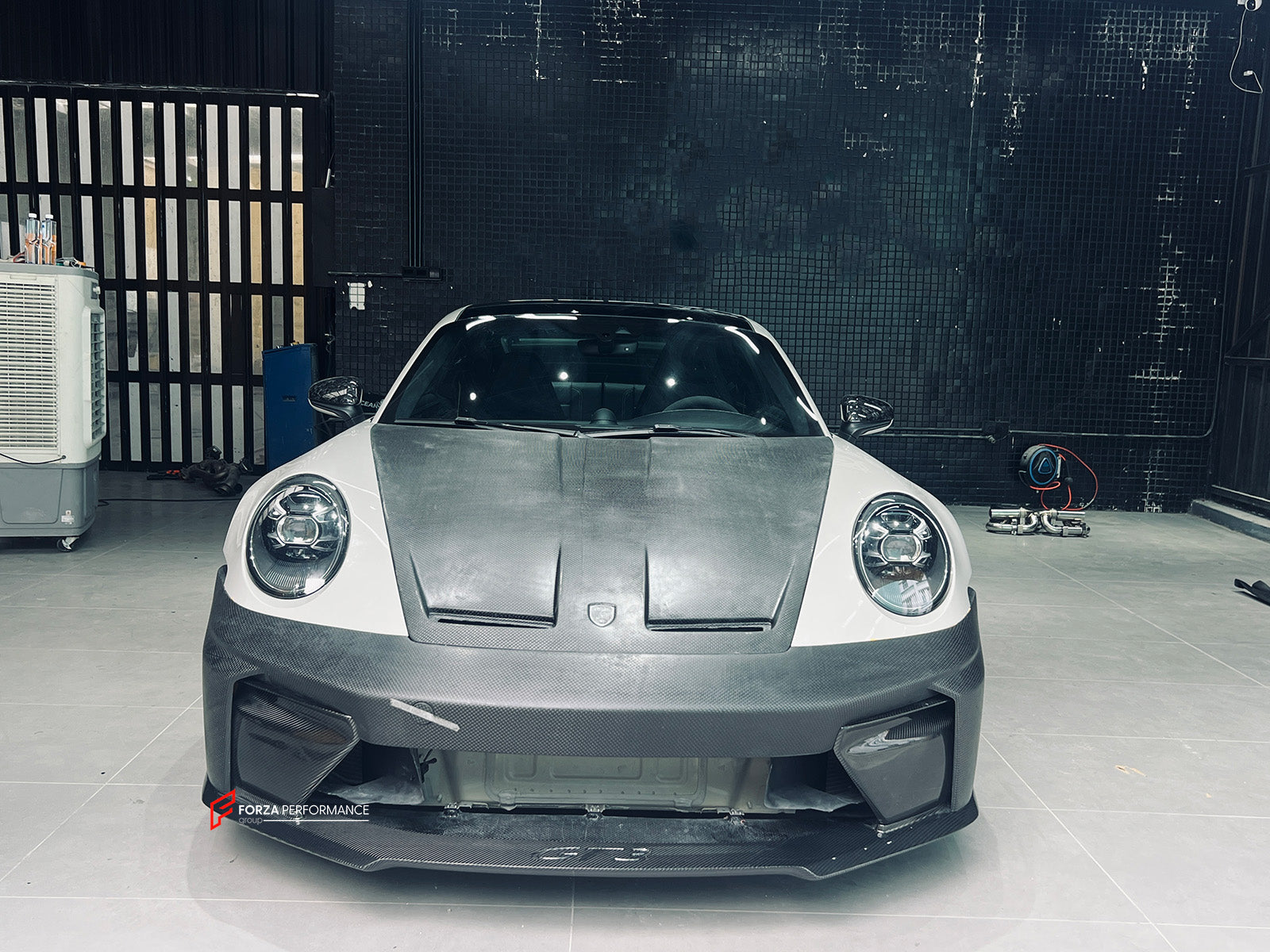 CONVERSION BODY KIT for PORSCHE 911 992.1 CARRERA 2019 - 2023 to 992.2 GT3

Set includes:
Front Bumper Assembly
Hood / Bonnet
Side Skirts
Rear Spoiler
Rear Bumper
Rear Diffuser
Muffler With Valves
Exhaust Tips

Material: Dry Carbon

NOTE: Professional installation is required