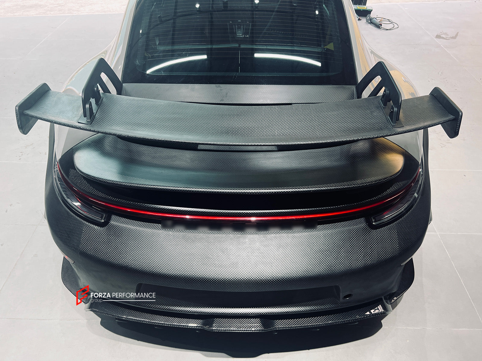 CONVERSION BODY KIT for PORSCHE 911 992.1 CARRERA 2019 - 2023 to 992.2 GT3

Set includes:
Front Bumper Assembly
Hood / Bonnet
Side Skirts
Rear Spoiler
Rear Bumper
Rear Diffuser
Muffler With Valves
Exhaust Tips

Material: Dry Carbon

NOTE: Professional installation is required