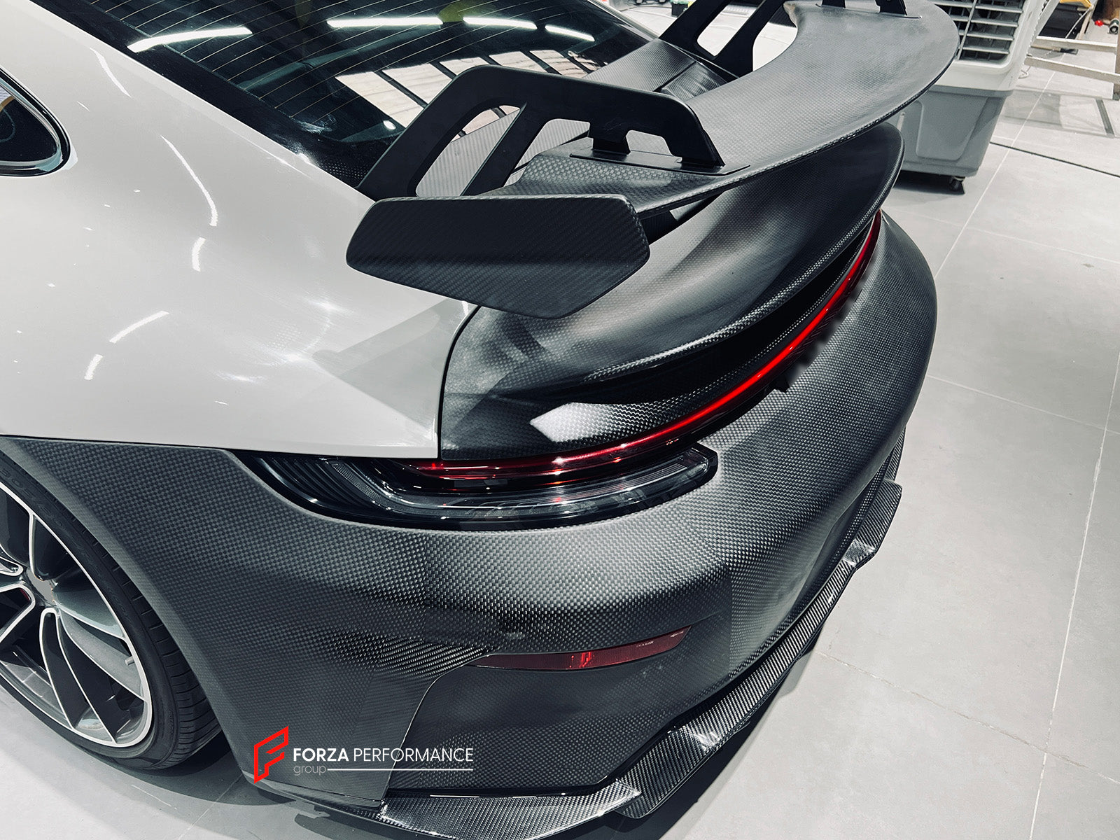 CONVERSION BODY KIT for PORSCHE 911 992.1 CARRERA 2019 - 2023 to 992.2 GT3

Set includes:
Front Bumper Assembly
Hood / Bonnet
Side Skirts
Rear Spoiler
Rear Bumper
Rear Diffuser
Muffler With Valves
Exhaust Tips

Material: Dry Carbon

NOTE: Professional installation is required