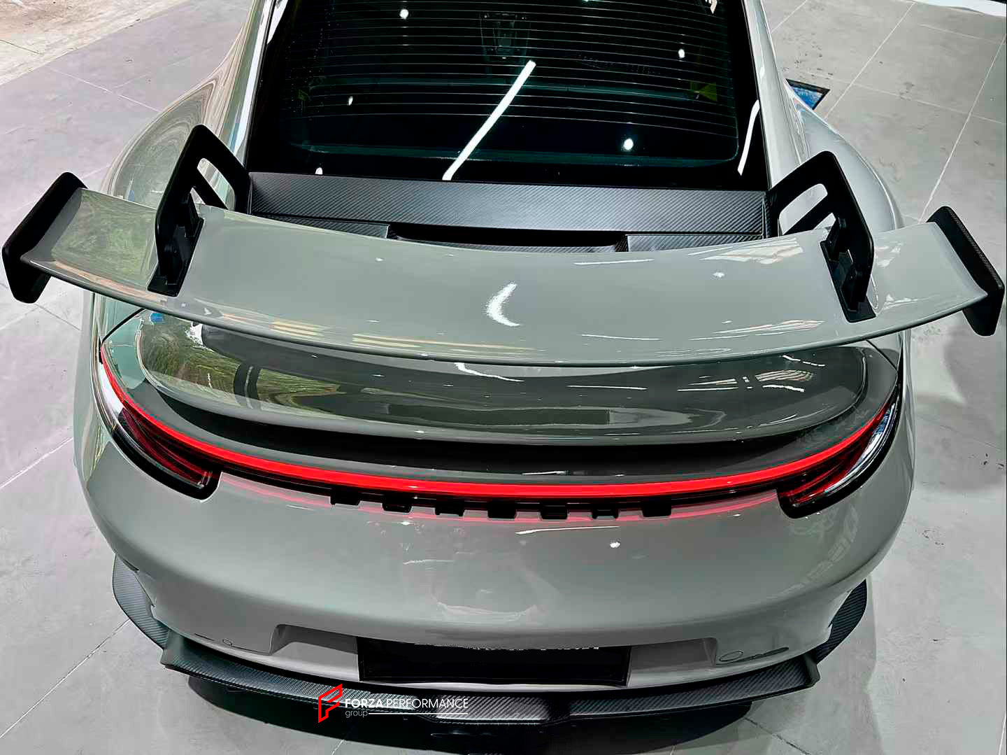 CONVERSION BODY KIT for PORSCHE 911 992.1 CARRERA 2019 - 2023 to 992.2 GT3

Set includes:
Front Bumper Assembly
Hood / Bonnet
Side Skirts
Rear Spoiler
Rear Bumper
Rear Diffuser
Muffler With Valves
Exhaust Tips

Material: Dry Carbon

NOTE: Professional installation is required