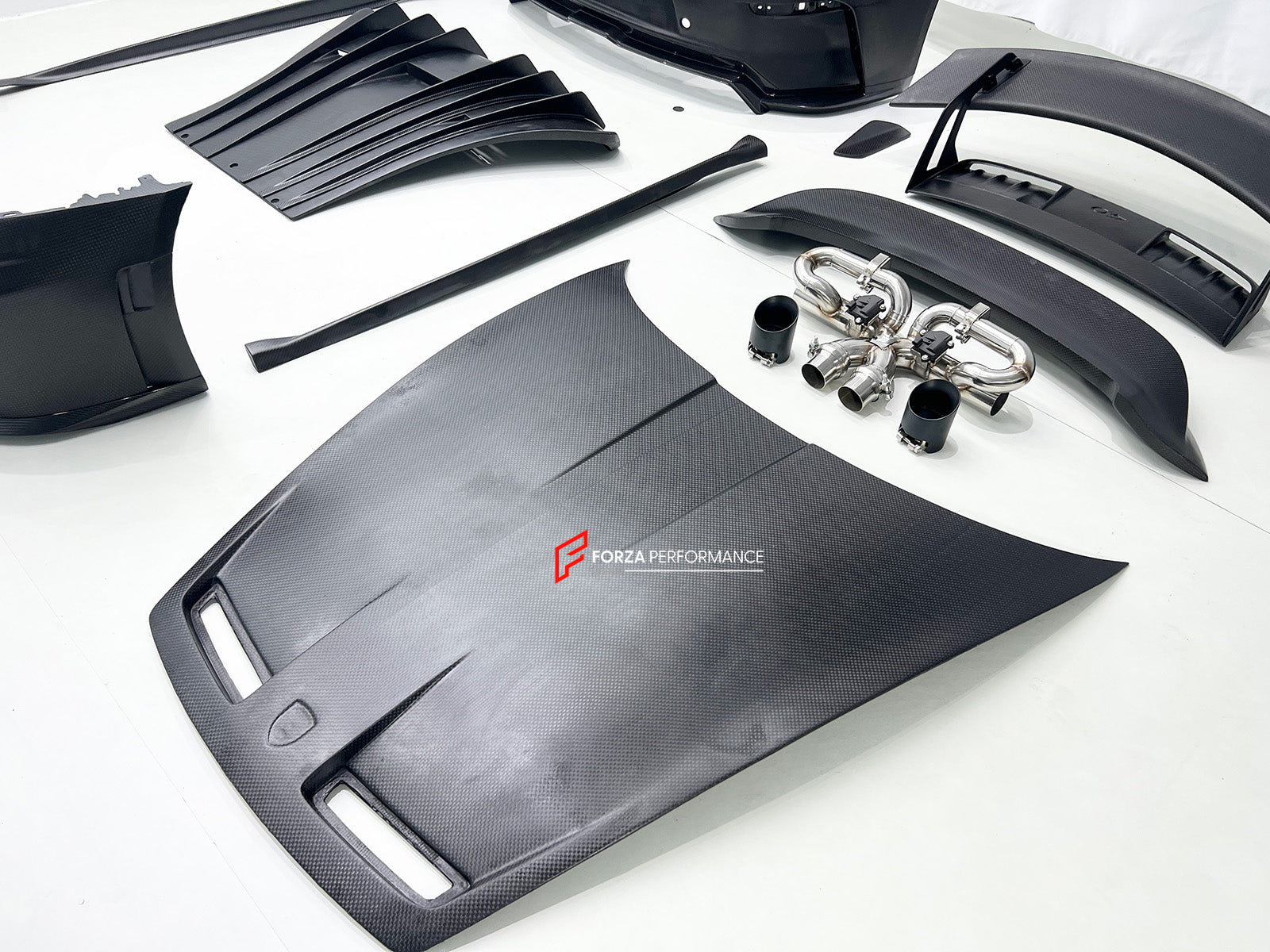 CONVERSION BODY KIT for PORSCHE 911 992.1 CARRERA 2019 - 2023 to 992.2 GT3

Set includes:
Front Bumper Assembly
Hood / Bonnet
Side Skirts
Rear Spoiler
Rear Bumper
Rear Diffuser
Muffler With Valves
Exhaust Tips

Material: Dry Carbon

NOTE: Professional installation is required