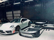 CONVERSION BODY KIT for PORSCHE 911 992.1 CARRERA 2019 - 2023 to 992.2 GT3

Set includes:
Front Bumper Assembly
Hood / Bonnet
Side Skirts
Rear Spoiler
Rear Bumper
Rear Diffuser
Muffler With Valves
Exhaust Tips

Material: Dry Carbon

NOTE: Professional installation is required