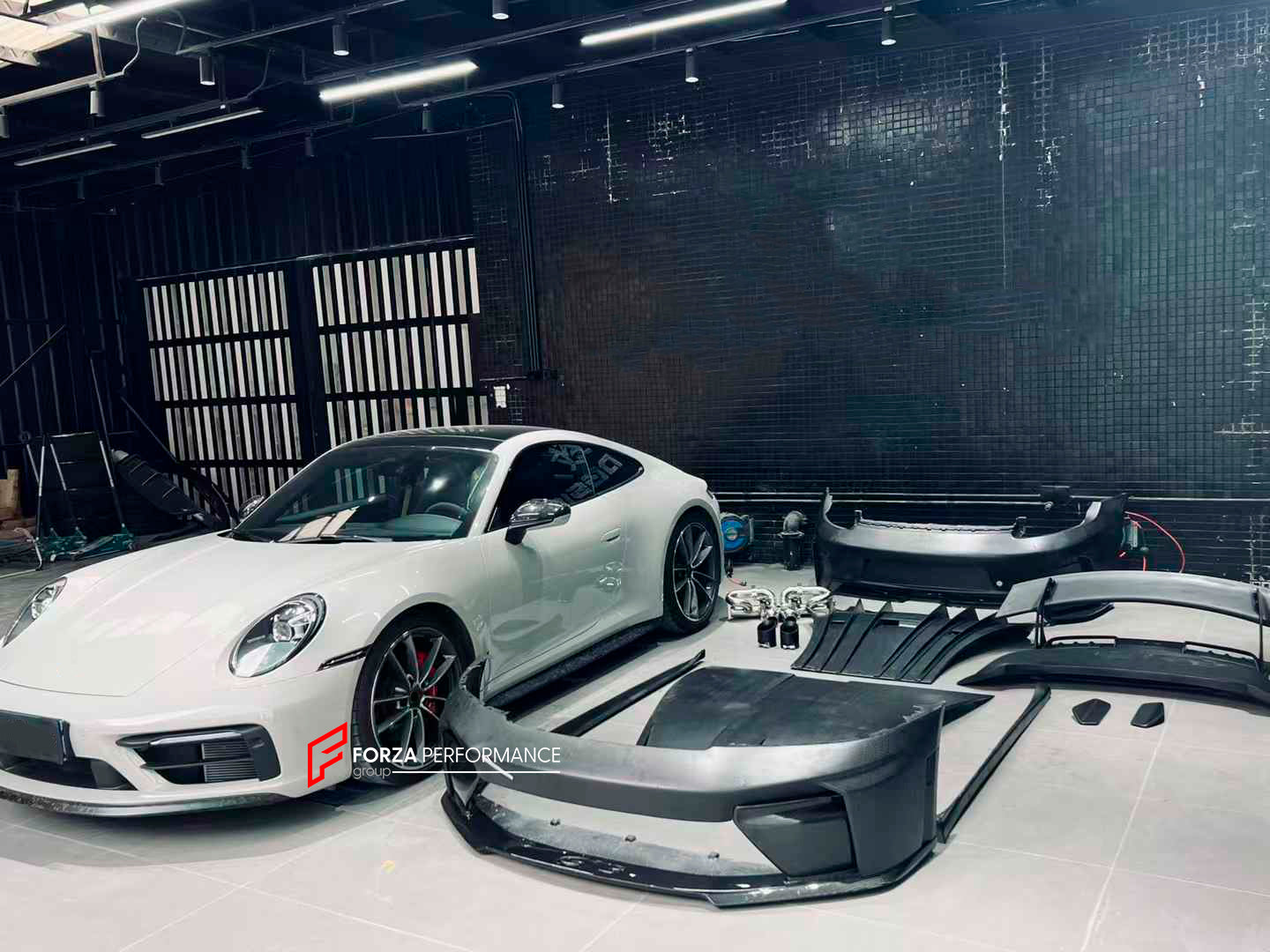 CONVERSION BODY KIT for PORSCHE 911 992.1 CARRERA 2019 - 2023 to 992.2 GT3

Set includes:
Front Bumper Assembly
Hood / Bonnet
Side Skirts
Rear Spoiler
Rear Bumper
Rear Diffuser
Muffler With Valves
Exhaust Tips

Material: Dry Carbon

NOTE: Professional installation is required