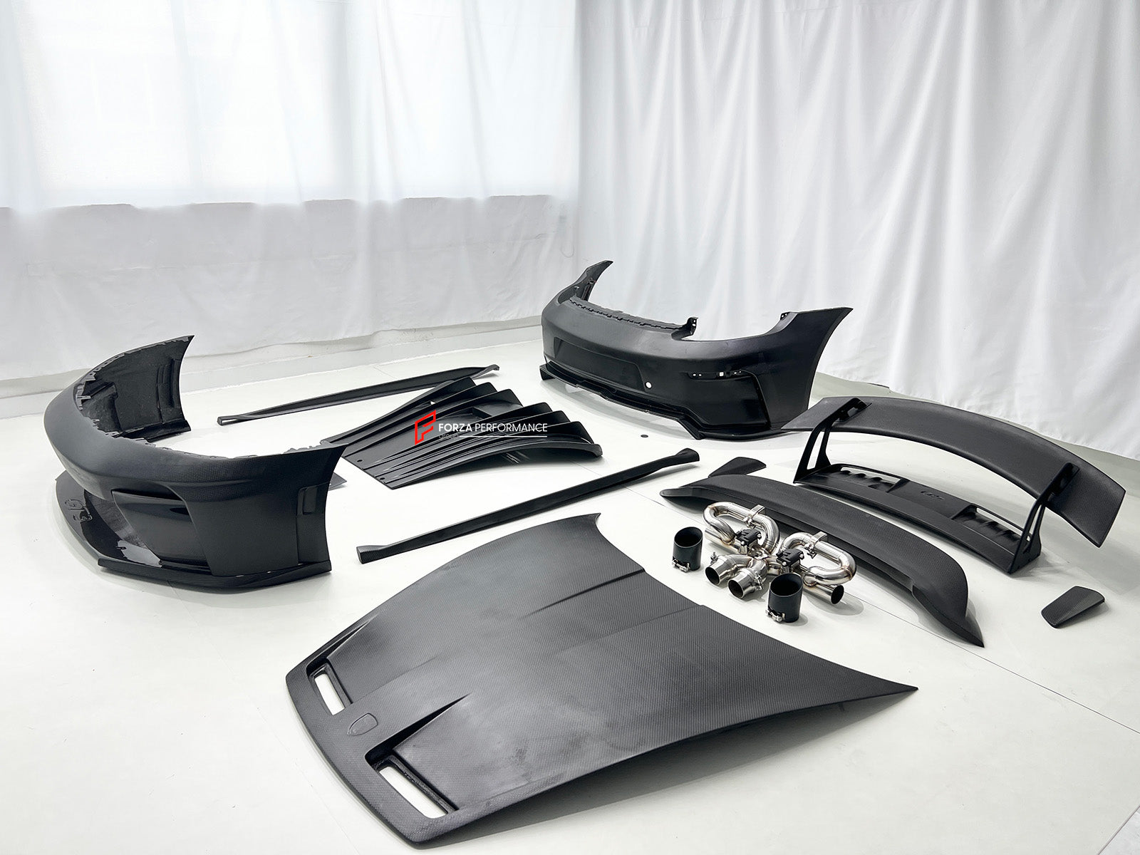 CONVERSION BODY KIT for PORSCHE 911 992.1 CARRERA 2019 - 2023 to 992.2 GT3

Set includes:
Front Bumper Assembly
Hood / Bonnet
Side Skirts
Rear Spoiler
Rear Bumper
Rear Diffuser
Muffler With Valves
Exhaust Tips

Material: Dry Carbon

NOTE: Professional installation is required