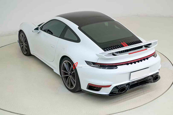 CONVERSION BODY KIT for PORSCHE 911 992 CARRERA 2019 - 2023 to TURBO SPORT DESIGN

Set includes:

Front Bumper
Front Lip
Side Skirts

Rear Diffuser

Rear Bumper
Rear Spoiler

Material: PP

Production time: 14 days

NOTE: Professional installation is required

Payment ►
Visa

Mastercard

PayPal with a credit card (add 4.4% at checkout)
Payoneer
Cryptocurrency
Shipment ►
By express DHL/UPS/TNT/FedEx
To the local international airport
Special line by air
Special line by the sea
To Europe and the UK by train

P