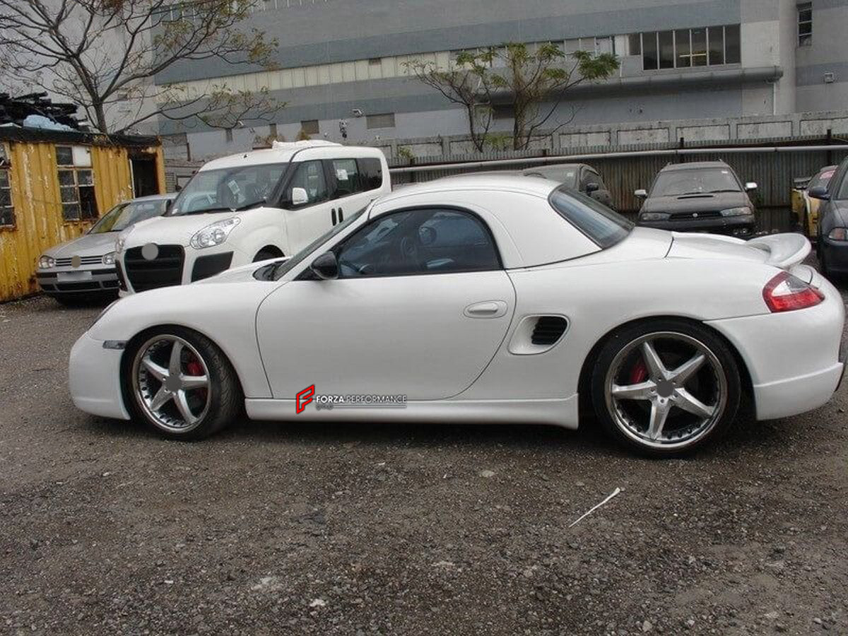 CONVERSION BODY KIT for PORSCHE BOXSTER 986 UPGRADE to BOXSTER 997

Set includes:
Front Bumper
Front Fender
Side Skirts
Rear Bumper
Rear Spoiler Wing
Headlight
LED Fog Light
Signal Light

NOTE: Professional installation is required