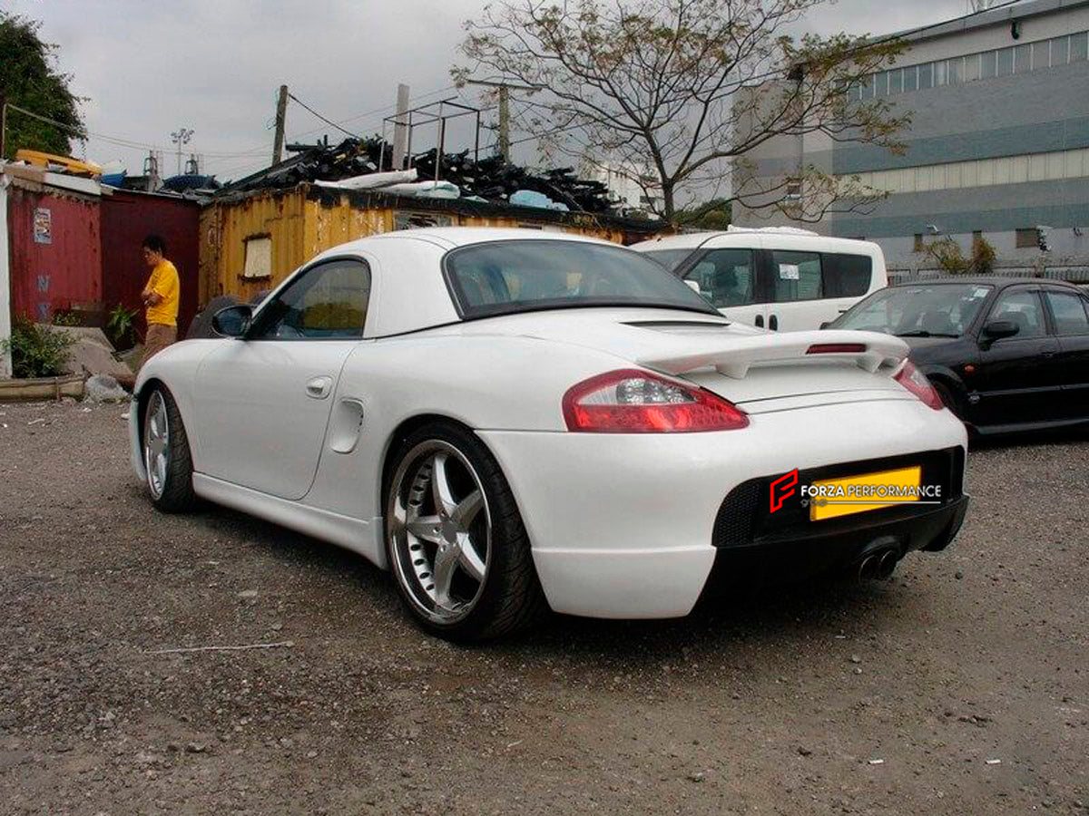 CONVERSION BODY KIT for PORSCHE BOXSTER 986 UPGRADE to BOXSTER 997

Set includes:
Front Bumper
Front Fender
Side Skirts
Rear Bumper
Rear Spoiler Wing
Headlight
LED Fog Light
Signal Light

NOTE: Professional installation is required
