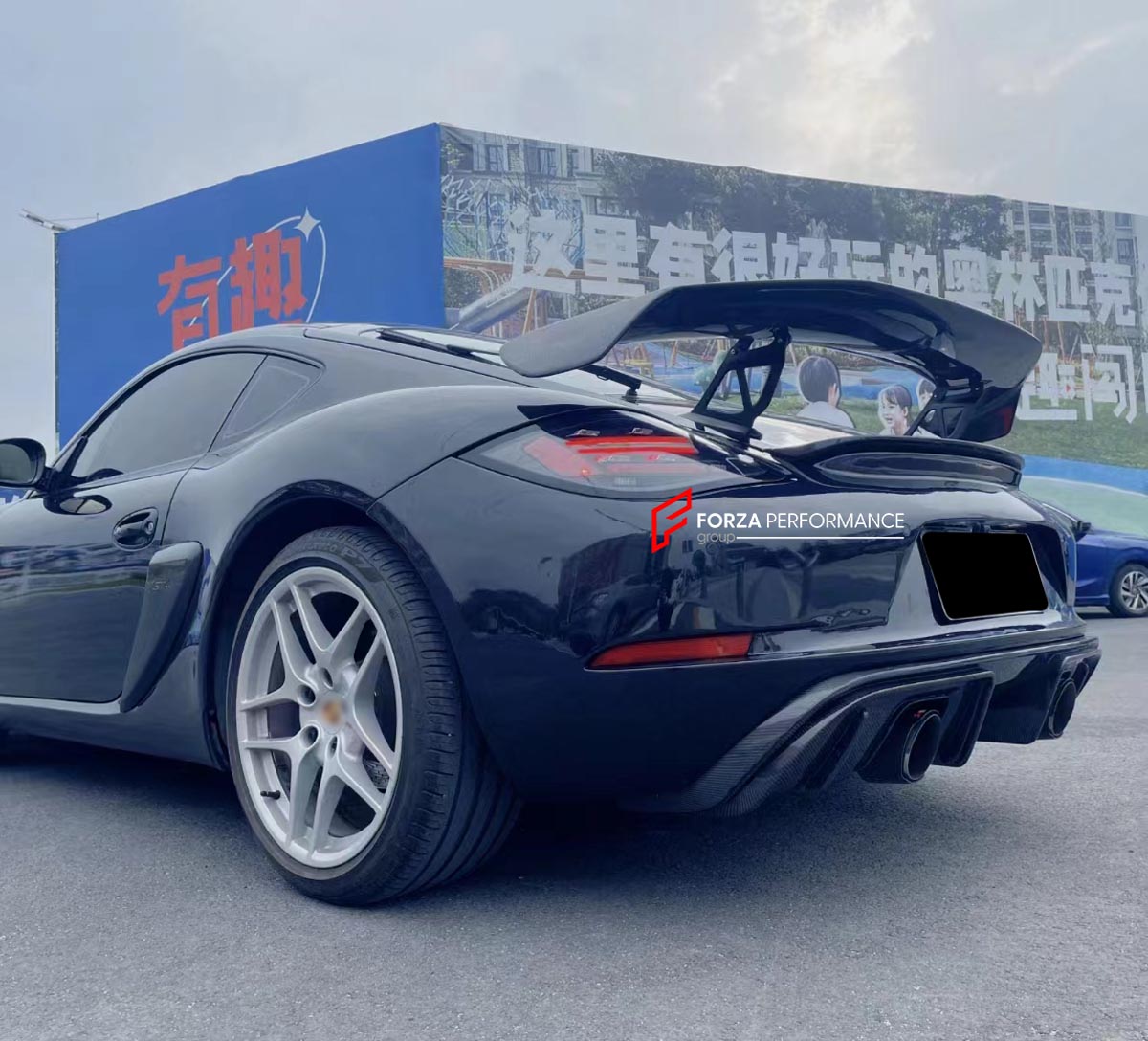 CONVERSION 718 982 GT4 BODY KIT for PORSCHE CAYMAN 987 2005 - 2013
Set includes:

Front Lip
Front Bumper Air Vent Trims
Front Bumper Fins
Front Grille
Led Light Covers / Front Fascia Attachments
License Plate
Rear Bumper Assembly (FRP)
Rear Diffuser (FRP)
Material: Plastic + FRP

NOTE: Professional installation is required.