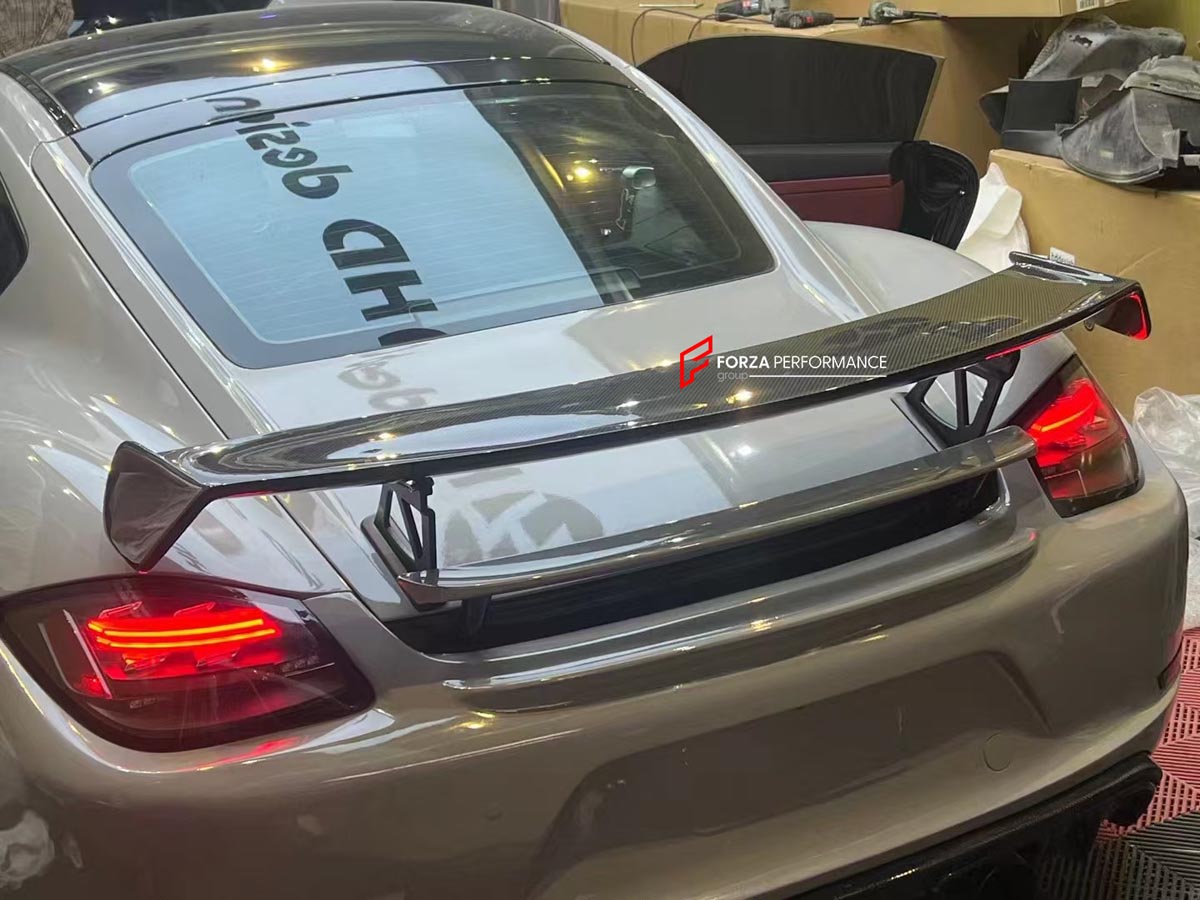 CONVERSION 718 982 GT4 BODY KIT for PORSCHE CAYMAN 987 2005 - 2013
Set includes:

Front Lip
Front Bumper Air Vent Trims
Front Bumper Fins
Front Grille
Led Light Covers / Front Fascia Attachments
License Plate
Rear Bumper Assembly (FRP)
Rear Diffuser (FRP)
Material: Plastic + FRP

NOTE: Professional installation is required.