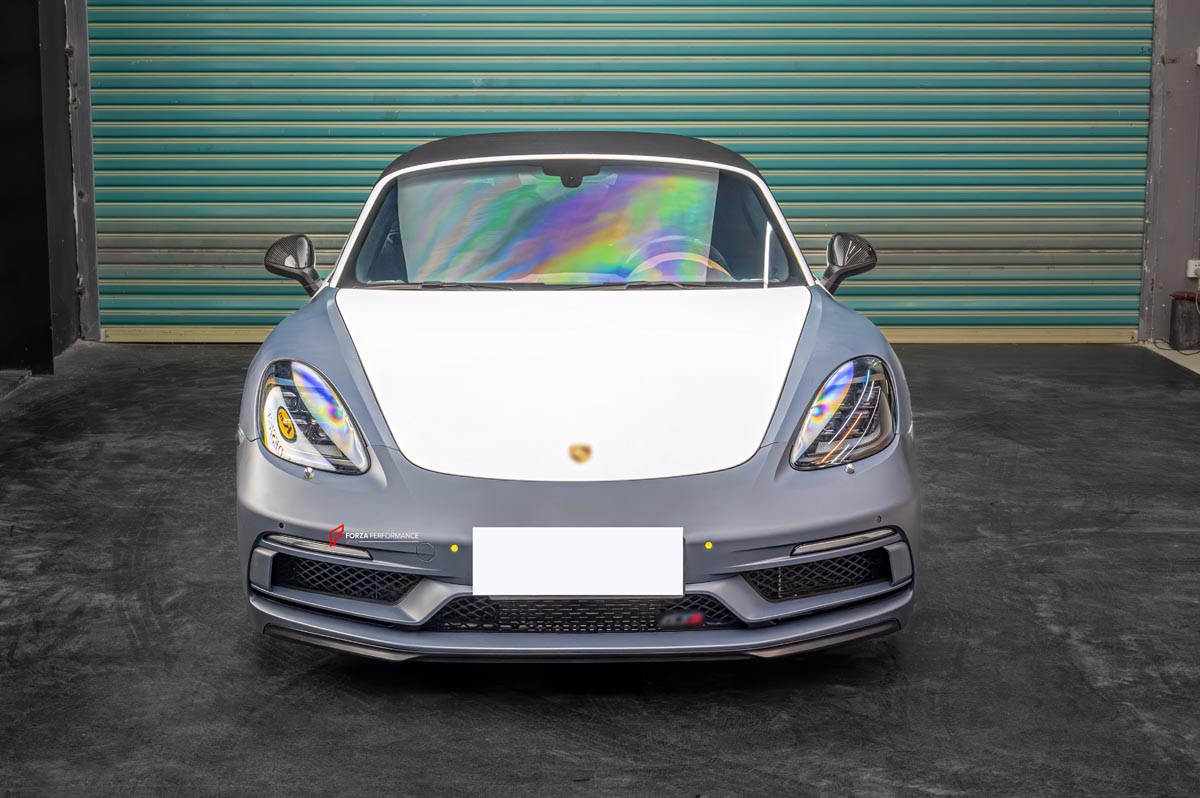 CONVERSION 718 982 GTS BODY KIT for PORSCHE CAYMAN BOXSTER 981 2012 - 2016
Set includes:

Front Bumper Assembly
Headlights
Front Fenders
Side Skirts
Taillights
Rear Bumper Assembly
Material: Plastic

NOTE: Professional installation is required.