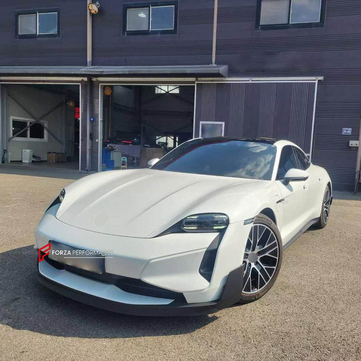 CONVERSION BODY KIT for PORSCHE TAYCAN 9J1.1 2020 - 2024 UPGRADE to TAYCAN TURBO GT 9J1.2 2024+ FORZA PERFORMANCE custom fit Turbo GT Style

Set includes:
Front Lip
Front Bumper Assembly
Rear Bumper Assembly
Rear Diffuser

Material: Plastic

NOTE: Professional installation is required.