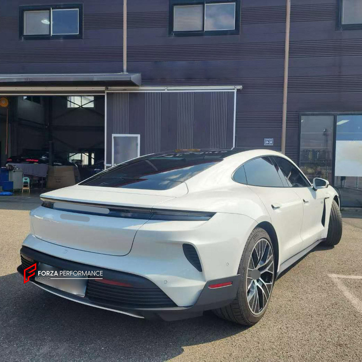 CONVERSION BODY KIT for PORSCHE TAYCAN 9J1.1 2020 - 2024 UPGRADE to TAYCAN TURBO GT 9J1.2 2024+ FORZA PERFORMANCE custom fit Turbo GT Style

Set includes:
Front Lip
Front Bumper Assembly
Rear Bumper Assembly
Rear Diffuser

Material: Plastic

NOTE: Professional installation is required.